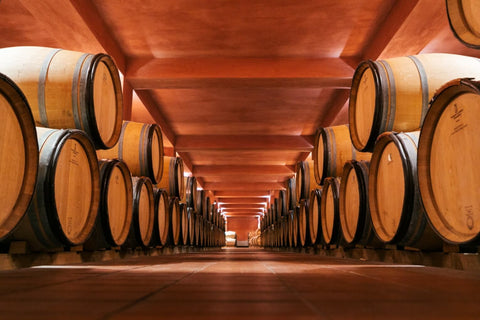 Tens of barrels in the Alpha Estate cellar where quality Xinomavro red wine is produced. 