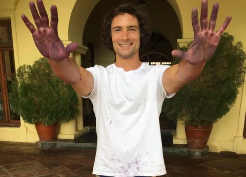 Pancho Lavaque who runs the Vallisto project, with his hand red from winemaking.