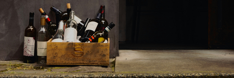 Crate of empty bottles that provides more questions than answers.