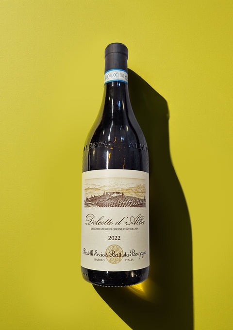 The Dolcetto d'alba red wine bottle with its classic label showing the 2022 vintage